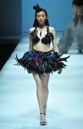 BEIJING, CHINA - MARCH 28: (CHINA OUT) A model showcases designs on the runway at XEFIEE Collection during the Mercedes-Benz China Fashion Week Autumn Winter 2016 2017 at 751D.Park on March 28, 2016 in Beijing, China.  CFP481829614
