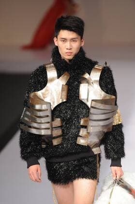 BEIJING, CHINA - MARCH 29: (CHINA OUT) A model showcases designs on the runway at Beijing Institute of Fashion Technology¡¤Emerging Design Collection & BIFT¡¤ELLASSAY Scholarship Awarding Ceremony during the Mercedes-Benz China Fashion Week Autumn Winter 2016 2017 at Beijing Hotel on March 29, 2016 in Beijing, China.  CFP481872716
