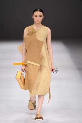 BEIJING, CHINA - MARCH 29: (CHINA OUT) A model showcases designs on the runway at Beijing Institute of Fashion Technology¡¤Emerging Design Collection & BIFT¡¤ELLASSAY Scholarship Awarding Ceremony during the Mercedes-Benz China Fashion Week Autumn Winter 2016 2017 at Beijing Hotel on March 29, 2016 in Beijing, China.  CFP481872723