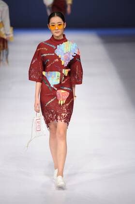BEIJING, CHINA - MARCH 29: (CHINA OUT) A model showcases designs on the runway at Beijing Institute of Fashion Technology¡¤Emerging Design Collection & BIFT¡¤ELLASSAY Scholarship Awarding Ceremony during the Mercedes-Benz China Fashion Week Autumn Winter 2016 2017 at Beijing Hotel on March 29, 2016 in Beijing, China.  CFP481872730