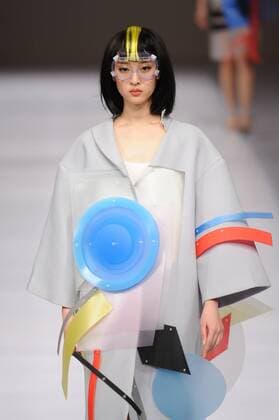 BEIJING, CHINA - MARCH 29: (CHINA OUT) A model showcases designs on the runway at Beijing Institute of Fashion Technology¡¤Emerging Design Collection & BIFT¡¤ELLASSAY Scholarship Awarding Ceremony during the Mercedes-Benz China Fashion Week Autumn Winter 2016 2017 at Beijing Hotel on March 29, 2016 in Beijing, China.  CFP481872733