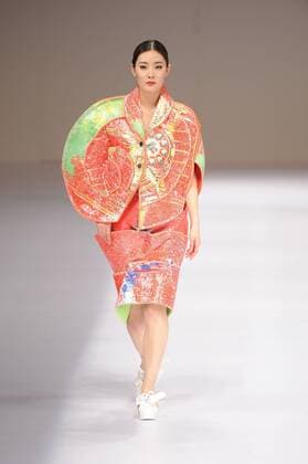 BEIJING, CHINA - MARCH 29: (CHINA OUT) A model showcases designs on the runway at Beijing Institute of Fashion Technology¡¤Emerging Design Collection & BIFT¡¤ELLASSAY Scholarship Awarding Ceremony during the Mercedes-Benz China Fashion Week Autumn Winter 2016 2017 at Beijing Hotel on March 29, 2016 in Beijing, China.  CFP481872739