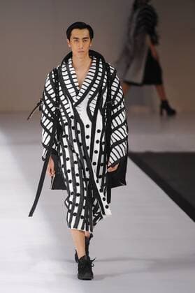 BEIJING, CHINA - MARCH 29: (CHINA OUT) A model showcases designs on the runway at Beijing Institute of Fashion Technology¡¤Emerging Design Collection & BIFT¡¤ELLASSAY Scholarship Awarding Ceremony during the Mercedes-Benz China Fashion Week Autumn Winter 2016 2017 at Beijing Hotel on March 29, 2016 in Beijing, China.  CFP481872754
