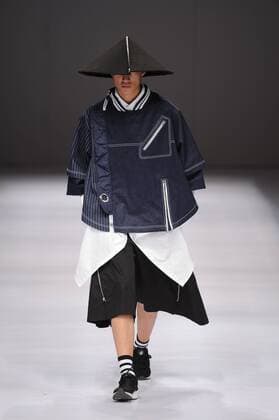BEIJING, CHINA - MARCH 29: (CHINA OUT) A model showcases designs on the runway at Beijing Institute of Fashion Technology¡¤Emerging Design Collection & BIFT¡¤ELLASSAY Scholarship Awarding Ceremony during the Mercedes-Benz China Fashion Week Autumn Winter 2016 2017 at Beijing Hotel on March 29, 2016 in Beijing, China.  CFP481872756