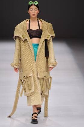BEIJING, CHINA - MARCH 29: (CHINA OUT) A model showcases designs on the runway at Beijing Institute of Fashion Technology¡¤Emerging Design Collection & BIFT¡¤ELLASSAY Scholarship Awarding Ceremony during the Mercedes-Benz China Fashion Week Autumn Winter 2016 2017 at Beijing Hotel on March 29, 2016 in Beijing, China.  CFP481872765