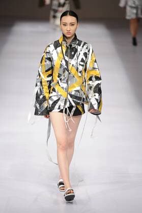 BEIJING, CHINA - MARCH 29: (CHINA OUT) A model showcases designs on the runway at Beijing Institute of Fashion Technology¡¤Emerging Design Collection & BIFT¡¤ELLASSAY Scholarship Awarding Ceremony during the Mercedes-Benz China Fashion Week Autumn Winter 2016 2017 at Beijing Hotel on March 29, 2016 in Beijing, China.  CFP481872781