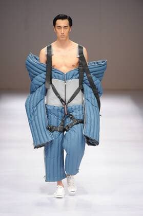 BEIJING, CHINA - MARCH 29: (CHINA OUT) A model showcases designs on the runway at Beijing Institute of Fashion Technology¡¤Emerging Design Collection & BIFT¡¤ELLASSAY Scholarship Awarding Ceremony during the Mercedes-Benz China Fashion Week Autumn Winter 2016 2017 at Beijing Hotel on March 29, 2016 in Beijing, China.  CFP481872788