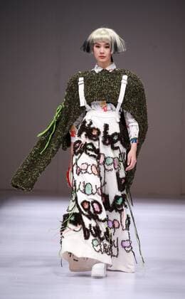 BEIJING, CHINA - MARCH 29: (CHINA OUT) A model showcases designs on the runway at Beijing Institute of Fashion Technology¡¤Emerging Design Collection & BIFT¡¤ELLASSAY Scholarship Awarding Ceremony during the Mercedes-Benz China Fashion Week Autumn Winter 2016 2017 at Beijing Hotel on March 29, 2016 in Beijing, China.  CFP481872869