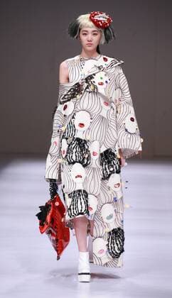 BEIJING, CHINA - MARCH 29: (CHINA OUT) A model showcases designs on the runway at Beijing Institute of Fashion Technology¡¤Emerging Design Collection & BIFT¡¤ELLASSAY Scholarship Awarding Ceremony during the Mercedes-Benz China Fashion Week Autumn Winter 2016 2017 at Beijing Hotel on March 29, 2016 in Beijing, China.  CFP481872871