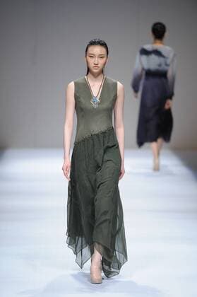 BEIJING, CHINA - MARCH 29: (CHINA OUT) A model showcases designs on the runway at Fei Gallery & Boutique Collection during the Mercedes-Benz China Fashion Week Autumn Winter 2016 2017 at Beijing Hotel on March 29, 2016 in Beijing, China.  CFP481873152