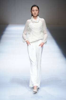 BEIJING, CHINA - MARCH 29: (CHINA OUT) A model showcases designs on the runway at Fei Gallery & Boutique Collection during the Mercedes-Benz China Fashion Week Autumn Winter 2016 2017 at Beijing Hotel on March 29, 2016 in Beijing, China.  CFP481873159