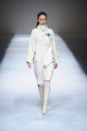 BEIJING, CHINA - MARCH 29: (CHINA OUT) A model showcases designs on the runway at Fei Gallery & Boutique Collection during the Mercedes-Benz China Fashion Week Autumn Winter 2016 2017 at Beijing Hotel on March 29, 2016 in Beijing, China.  CFP481873132