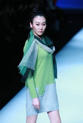 BEIJING, CHINA - MARCH 29: (CHINA OUT) A model showcases designs on the runway at Ling Wu Fine Cashmere Fashion Brands Joint Collection during the Mercedes-Benz China Fashion Week Autumn Winter 2016 2017 at 751D¡¤PARK on March 29, 2016 in Beijing, China.  CFP481886697