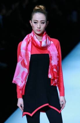 BEIJING, CHINA - MARCH 29: (CHINA OUT) A model showcases designs on the runway at Ling Wu Fine Cashmere Fashion Brands Joint Collection during the Mercedes-Benz China Fashion Week Autumn Winter 2016 2017 at 751D¡¤PARK on March 29, 2016 in Beijing, China.  CFP481886699