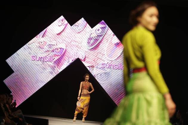 March 30, 2016 - Kathmandu, Nepal - Models catwalk on the runway during the Nepal fashion week also known as The Himalayan Times TGIF Nepal Fashion Week at Hyatt Regency in Kathmandu, Nepal on Wednesday, March 30, 2016. Celebrities and fashion models from around the world come to represent for the designers to promote their designs. The event is the top most fashion week of the country held annually by The Himalayan Times, a leading and largest selling English daily newspaper in Nepal. The fashion week lasts for 4 days with glitz and glamor on the catwalk. Kathmandu Nepal - ZUMAg200