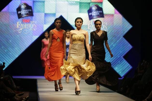 March 30, 2016 - Kathmandu, Nepal - Nepalese models catwalk on the runway during the Nepal fashion week also known as The Himalayan Times TGIF Nepal Fashion Week at Hyatt Regency in Kathmandu, Nepal on Wednesday, March 30, 2016. Celebrities and fashion models from around the world come to represent for the designers to promote their designs. The event is the top most fashion week of the country held annually by The Himalayan Times, a leading and largest selling English daily newspaper in Nepal. The fashion week lasts for 4 days with glitz and glamor on the catwalk. Kathmandu Nepal - ZUMAg200