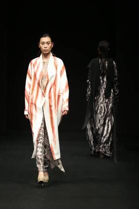 BEIJING, CHINA - MARCH 30: (CHINA OUT) A model showcases designs on the runway at XINSHEN LINEN & Sun Lin Collection during the Mercedes-Benz China Fashion Week Autumn Winter 2016 2017 at 751D.Park on March 30, 2016 in Beijing, China.  CFP481928442