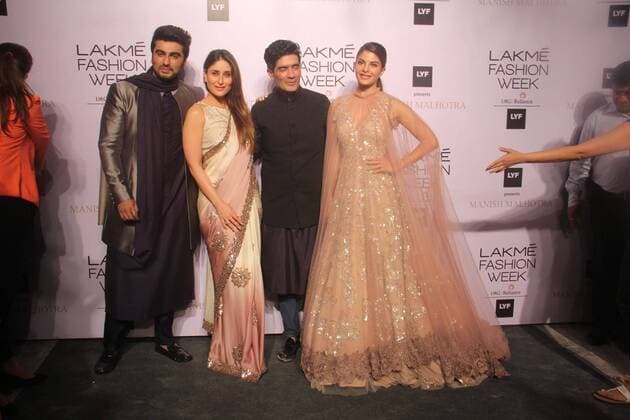 MUMBAI, INDIA - MARCH 29: Indian Fashion designer Manish Malhotra with Bollywood actors Kareena Kapoor Khan, Arjun Kapoor and Jacqueline Fernandez during the opening show of Lakme Fashion Week Summer Resort 2016, at Mehboob Studio, Bandra on March 29, 2016 in Mumbai, India. (Photo by Pramod Thakur Hindustan Times ) Lakme Fashion Week Summer Resort 2016