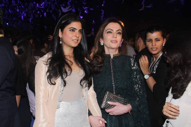 MUMBAI, INDIA - MARCH 29: Nita Ambani, Founder and Chairperson, Reliance Foundation along with her daughter Isha Ambani during the opening show of Lakme Fashion Week Summer Resort 2016, at Mehboob Studio, Bandra on March 29, 2016 in Mumbai, India. (Photo by Pramod Thakur Hindustan Times ) Lakme Fashion Week Summer Resort 2016