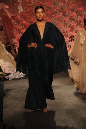 MUMBAI, INDIA - MARCH 29: A model displays the creation of fashion designer Manish Malhotra during the opening show of Lakme Fashion Week Summer Resort 2016, at Mehboob Studio, Bandra on March 29, 2016 in Mumbai, India. (Photo by Pramod Thakur Hindustan Times ) Lakme Fashion Week Summer Resort 2016