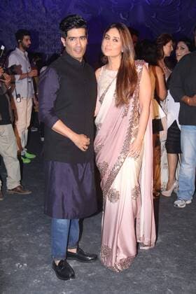 MUMBAI, INDIA - MARCH 29: Bollywood actor Kareena Kapoor Khan with fashion designer Manish Malhotra during the opening show of Lakme Fashion Week Summer Resort 2016, at Mehboob Studio, Bandra on March 29, 2016 in Mumbai, India. (Photo by Pramod Thakur Hindustan Times ) Lakme Fashion Week Summer Resort 2016