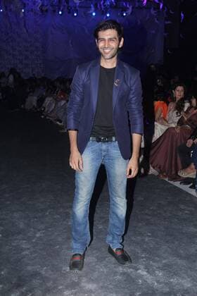 MUMBAI, INDIA - MARCH 29: Bollywood actor Kartik Aaryan during the opening show of Lakme Fashion Week Summer Resort 2016, at Mehboob Studio, Bandra on March 29, 2016 in Mumbai, India. (Photo by Pramod Thakur Hindustan Times ) Lakme Fashion Week Summer Resort 2016