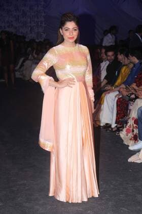 MUMBAI, INDIA - MARCH 29: Bollywood singer Kanika Kapoor during the opening show of Lakme Fashion Week Summer Resort 2016, at Mehboob Studio, Bandra on March 29, 2016 in Mumbai, India. (Photo by Pramod Thakur Hindustan Times ) Lakme Fashion Week Summer Resort 2016