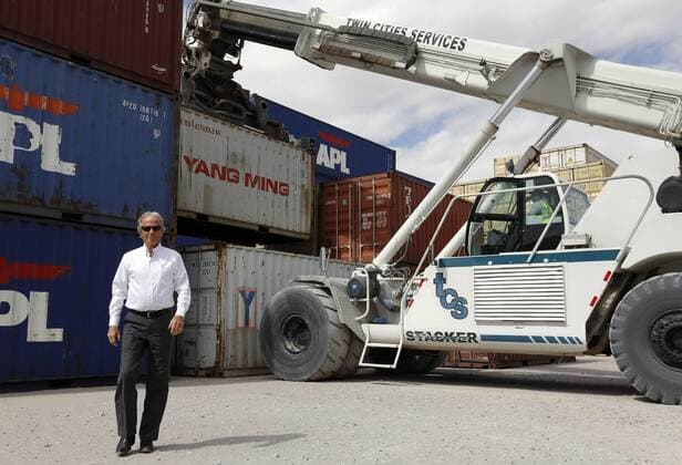 March 31, 2016 - Santa Teresa, NM, U.S. - Ed Hazelton, president of Twin Cities Services, walks among containers as the stacker operates in Santa Teresa, New Mexico, Thursday, March 31, 2016. Santa Teresa U.S. - ZUMAab1_