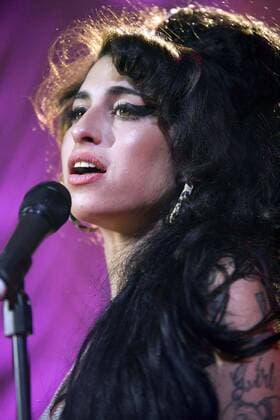 File Photo: AMY WINEHOUSE, the Grammy-winning singer known as much for her long battles with drugs and alcohol as for her stunning soulful voice, was found dead at her London home. Winehouse won worldwide stardom with albums in 2003 and 2006. PICTURED: May 28, 2007 - London, England, United Kingdom - AMY WINEHOUSE live in concert at the Shepherds Bush Empire. - ZUMAg49_
