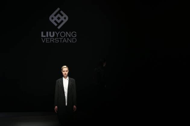 BEIJING, CHINA - MARCH 31: (CHINA OUT) A model showcases designs on the runway at Henry Herbert Liu Yong Private Custom Collection during the Mercedes-Benz China Fashion Week Autumn Winter 2016 2017 at 751D.Park on March 31, 2016 in Beijing, China.  CFP481994439