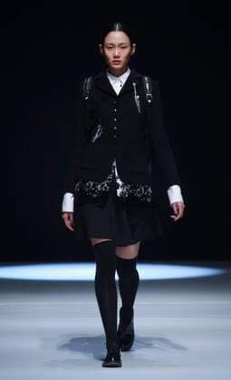 BEIJING, CHINA - MARCH 31: (CHINA OUT) A model showcases designs on the runway at Henry Herbert Liu Yong Private Custom Collection during the Mercedes-Benz China Fashion Week Autumn Winter 2016 2017 at 751D.Park on March 31, 2016 in Beijing, China.  CFP481994442