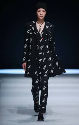 BEIJING, CHINA - MARCH 31: (CHINA OUT) A model showcases designs on the runway at Henry Herbert Liu Yong Private Custom Collection during the Mercedes-Benz China Fashion Week Autumn Winter 2016 2017 at 751D.Park on March 31, 2016 in Beijing, China.  CFP481994446