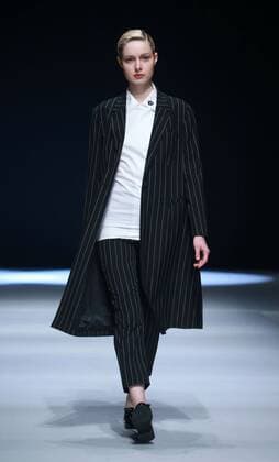 BEIJING, CHINA - MARCH 31: (CHINA OUT) A model showcases designs on the runway at Henry Herbert Liu Yong Private Custom Collection during the Mercedes-Benz China Fashion Week Autumn Winter 2016 2017 at 751D.Park on March 31, 2016 in Beijing, China.  CFP481994448