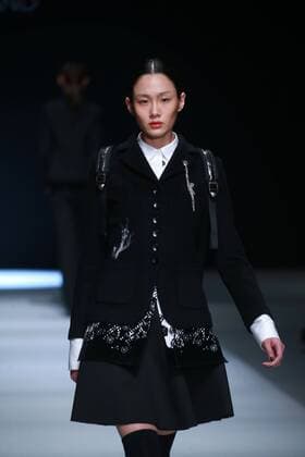 BEIJING, CHINA - MARCH 31: (CHINA OUT) A model showcases designs on the runway at Henry Herbert Liu Yong Private Custom Collection during the Mercedes-Benz China Fashion Week Autumn Winter 2016 2017 at 751D.Park on March 31, 2016 in Beijing, China.  CFP481994458
