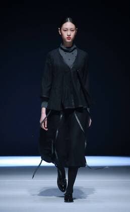 BEIJING, CHINA - MARCH 31: (CHINA OUT) A model showcases designs on the runway at Henry Herbert Liu Yong Private Custom Collection during the Mercedes-Benz China Fashion Week Autumn Winter 2016 2017 at 751D.Park on March 31, 2016 in Beijing, China.  CFP481994459