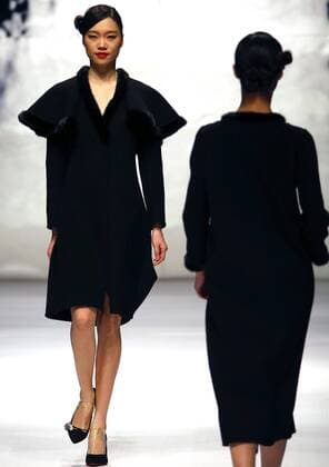 Models showcase fashion designs by Zoual Yanti during China s fashion week in Beijing on March 31, 2016. Chinese fashion designers are becoming an international force with both European and American fashion houses looking at the new, fresh Chinese clothing-minds as potential partners in future clothing brands.  PEK2016033126 STEPHENxSHAVER
