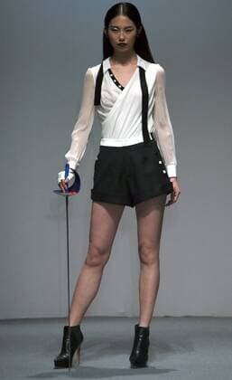 Models showcase fashion designs by Zoual Yanti during China s fashion week in Beijing on March 31, 2016. Chinese fashion designers are becoming an international force with both European and American fashion houses looking at the new, fresh Chinese clothing-minds as potential partners in future clothing brands.  PEK2016033137 STEPHENxSHAVER