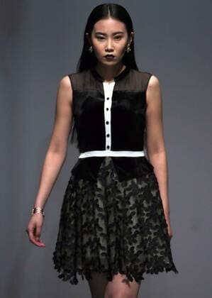 Models showcase fashion designs by Zoual Yanti during China s fashion week in Beijing on March 31, 2016. Chinese fashion designers are becoming an international force with both European and American fashion houses looking at the new, fresh Chinese clothing-minds as potential partners in future clothing brands.  PEK2016033141 STEPHENxSHAVER