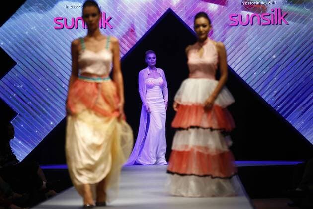 March 31, 2016 - Kathmandu, Nepal - Models catwalk on the runway on the second day of Nepal fashion week also known as The Himalayan Times TGIF Nepal Fashion Week at Hyatt Regency in Kathmandu, Nepal on Thursday, March 31, 2016. Celebrities and fashion models from around the world come to represent for the designers to promote their designs. The event is the top most fashion week of the country held annually by The Himalayan Times, a leading and largest selling English daily newspaper in Nepal. The fashion week lasts for 4 days with glitz and glamor on the catwalk. Kathmandu Nepal - ZUMAg200