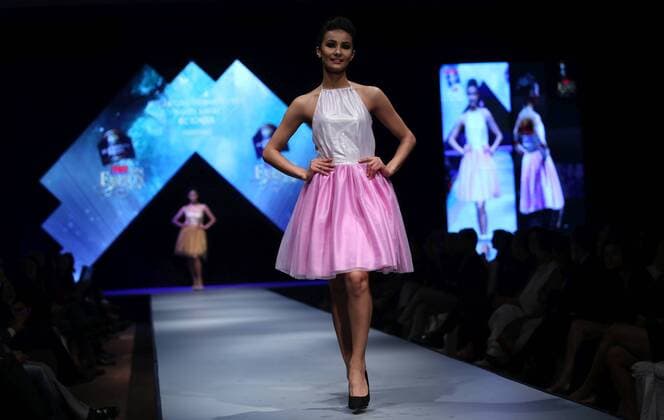 March 31, 2016 - Kathmandu, Nepal - A Model walks on the ramp wearing a designers creation during the second day of TGIF Nepal Fashion week in Kathmandu.National and International models present various creations prepared by renowned and amateur designers.The four days long fashion week will showcase creations of designers with Nepali and International fusions. Kathmandu Nepal - ZUMAs233