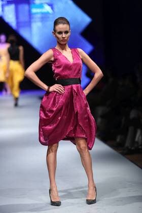 March 31, 2016 - Kathmandu, Nepal - A model walks on the ramp wearing a designers creation during the second day of TGIF Nepal Fashion week in Kathmandu.National and International models present various creations prepared by renowned and amateur designers.The four days long fashion week will showcase creations of designers with Nepali and International fusions. Kathmandu Nepal - ZUMAs233
