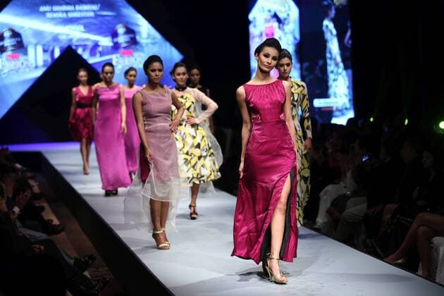 March 31, 2016 - Kathmandu, Nepal - Models walk on the ramp wearing various designers creation during the second day of TGIF Nepal Fashion week in Kathmandu.National and International models present various creations prepared by renowned and amateur designers.The four days long fashion week will showcase creations of designers with Nepali and International fusions. Kathmandu Nepal - ZUMAs233