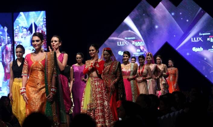 March 31, 2016 - Kathmandu, Nepal - Models walk on the ramp wearing various designers creation during the second day of TGIF Nepal Fashion week in Kathmandu.National and International models present various creations prepared by renowned and amateur designers.The four days long fashion week will showcase creations of designers with Nepali and International fusions. Kathmandu Nepal - ZUMAs233