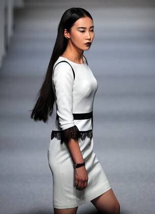 Models showcase fashion designs by Zoual Yanti during China s fashion week in Beijing on March 31, 2016. Chinese fashion designers are becoming an international force with both European and American fashion houses looking at the new, fresh Chinese clothing-minds as potential partners in future clothing brands.  PEK20160331997 STEPHENxSHAVER