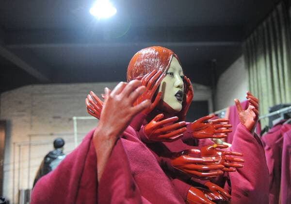 BEIJING, CHINA - MARCH 31: (CHINA OUT) A model prepares at backstage prior to the Sheguang Hu Collection during the Mercedes-Benz China Fashion Week Autumn Winter 2016 2017 at 751D.Park on March 31, 2016 in Beijing, China.  CFP481979933