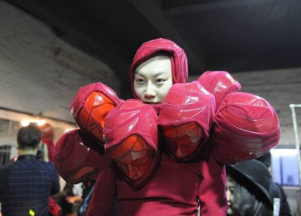 BEIJING, CHINA - MARCH 31: (CHINA OUT) A model prepares at backstage prior to the Sheguang Hu Collection during the Mercedes-Benz China Fashion Week Autumn Winter 2016 2017 at 751D.Park on March 31, 2016 in Beijing, China.  CFP481979941