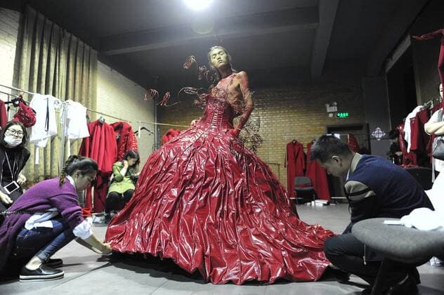 BEIJING, CHINA - MARCH 31: (CHINA OUT) A model prepares at backstage prior to the Sheguang Hu Collection during the Mercedes-Benz China Fashion Week Autumn Winter 2016 2017 at 751D.Park on March 31, 2016 in Beijing, China.  CFP481979946