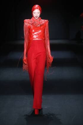 BEIJING, CHINA - MARCH 31: (CHINA OUT) A model showcases designs on the runway at Sheguang Hu Collection during the Mercedes-Benz China Fashion Week Autumn Winter 2016 2017 at 751D.Park on March 31, 2016 in Beijing, China.  CFP481980086