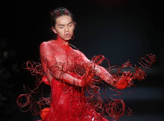 BEIJING, CHINA - MARCH 31: (CHINA OUT) A model showcases designs on the runway at Sheguang Hu Collection during the Mercedes-Benz China Fashion Week Autumn Winter 2016 2017 at 751D.Park on March 31, 2016 in Beijing, China.  CFP481980107