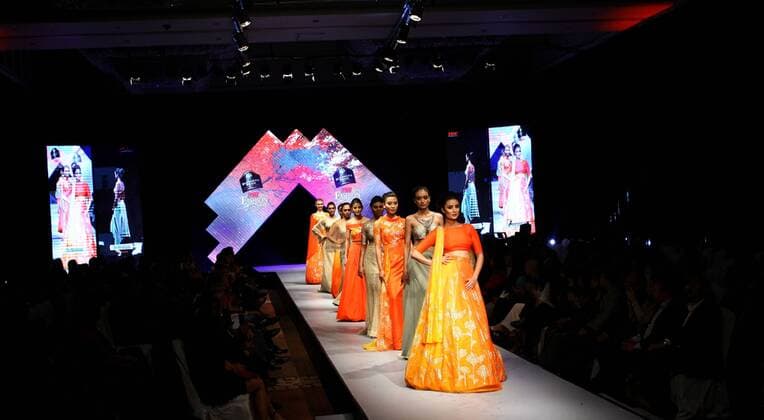 KATHMANDU, April 1, 2016 -- Models present creations during the third day of TGIF Nepal Fashion Week in Kathmandu, Nepal, April 1, 2016. The four-day fashion week presented both domestic and foreign designers creations. ) NEPAL-KATHMANDU-TGIF FASHION WEEK SunilxSharma 
